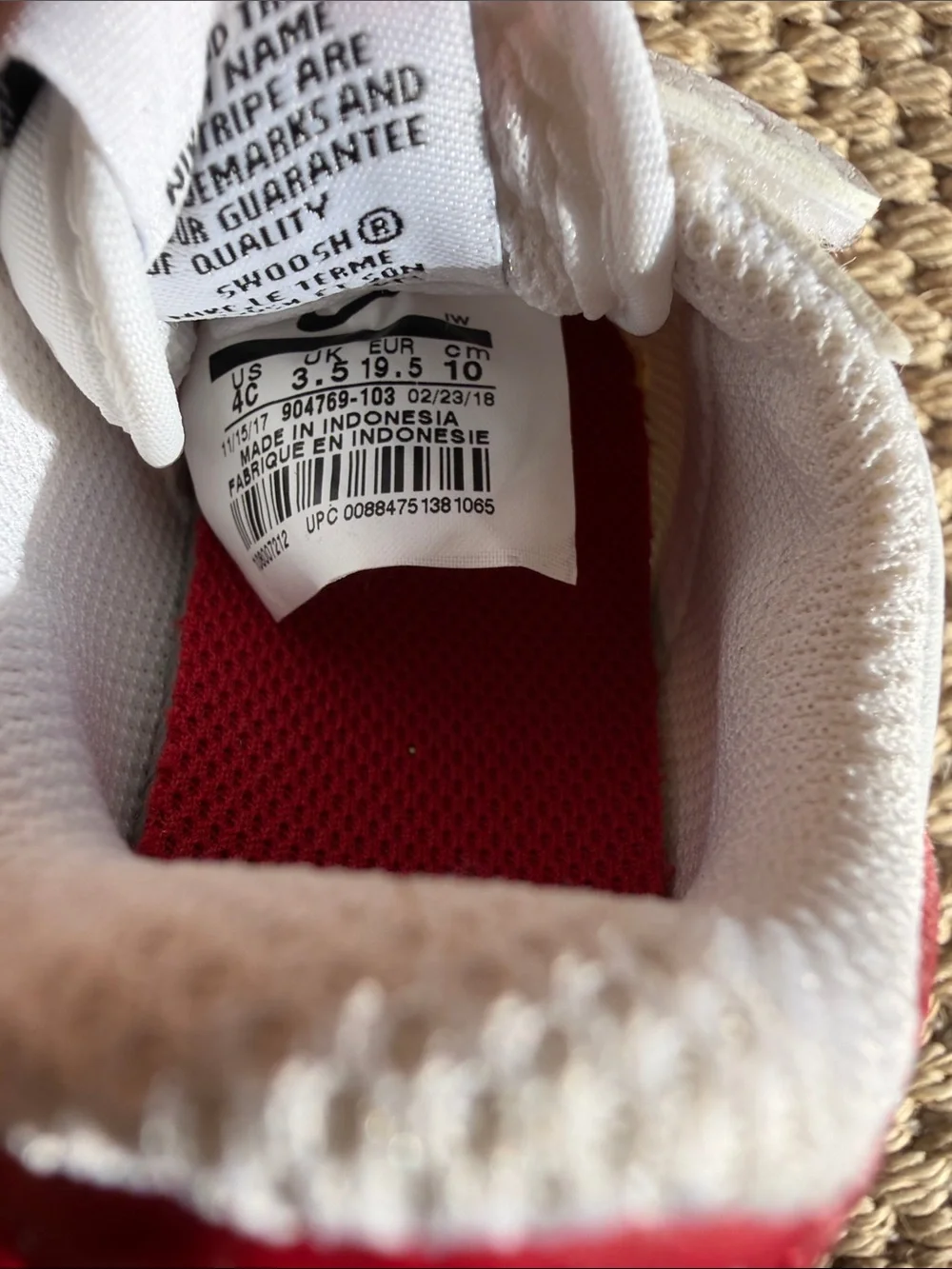 Nike White Baby Sneakers with Red Swoosh and Blue Accent size 4c
